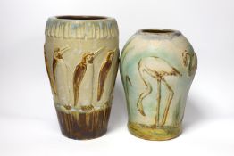 Two Denby ware pottery vases decorated in relief with penguins and flamingos, largest 26cm high