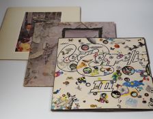 Three Led Zeppelin LP record albums; Led Zeppelin III with green and orange label (K50002), Led