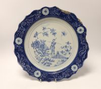 An 18th century Lambeth delftware charger, 34cm in diameter