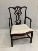 A George III style mahogany elbow chair, width 60cm, depth 50cm, height 100cm