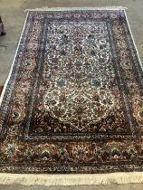 A North West Persian ivory ground rug, 220 x 136cm