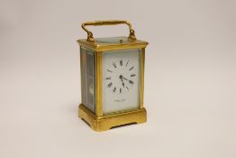 A gilt brass carriage clock with repeater, the dial inscribed Edward & Sons Glasgow, 18cm high