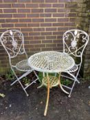 A circular metal garden table, diameter 59cm, height 66cm, and two folding chairs