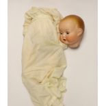 An Armande Marseille bisque head doll with open/close eyes, numbered 518 (a.f)