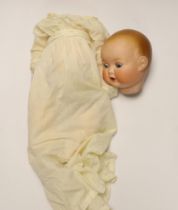 An Armande Marseille bisque head doll with open/close eyes, numbered 518 (a.f)