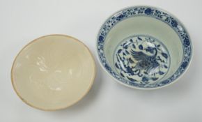 A Chinese blue and white porcelain bowl, Xuande mark but later and another bowl