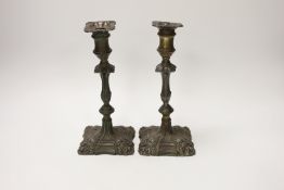 A pair of late 18th century Old Sheffield plate candlesticks, 24cm high