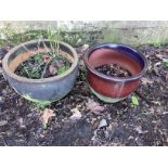 Two circular glazed earthenware garden planters, larger diameter 52cm, height 40cm, together with