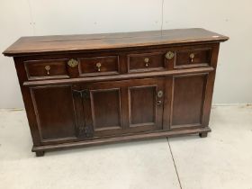 A small 18th century oak low dresser, width 152cm, depth 46cm, height 87cm