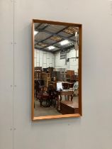 A mid century Danish style rectangular teak wall mirror, width 54cm, height 103cm