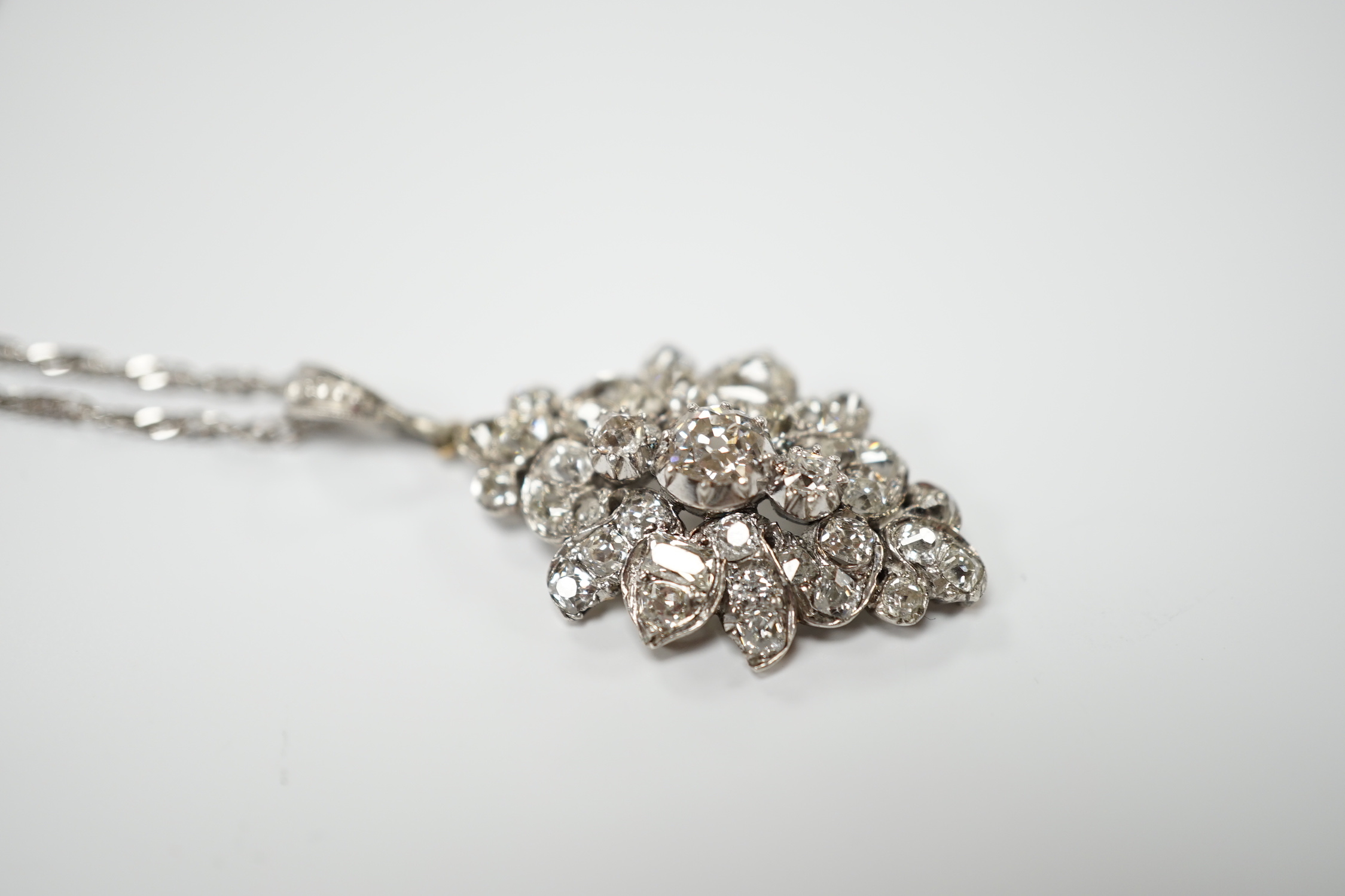 A white metal and diamond cluster set oval pendant, 27mm, on 9kt white metal chain, gross weight 5.8 - Image 3 of 4