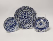 A Chinese Kangxi blue and white saucer dish and plate, and a similar 19th century blue and white