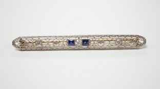 A Belle Époque style pierced 14k, sapphire and diamond cluster set bar brooch, 70mm, gross weight
