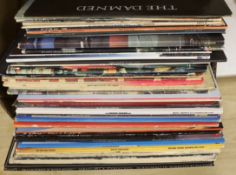 Forty LP record albums by artists including; the Damned, Mike Oldfield, the Rolling Stones, ELO,