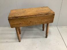 A Victorian pine drop flap table, width 89cm, depth 42cm, height 74cm (missing drawer)