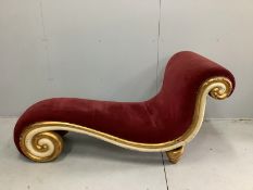 A mid century giltwood upholstered scroll frame chaise longue, length 164cm, width 84cm, height