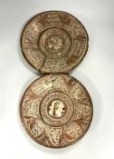 Two 16th/17th century Hispano moresque copper lustre dishes (damaged and repaired), 31cm diameter