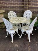 A Victorian style circular metal garden table, diameter 68cm, height 64cm, and four chairs