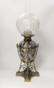Mark V Marshall for Doulton Lambeth stoneware oil lamp on brass stand with etched glass shade,