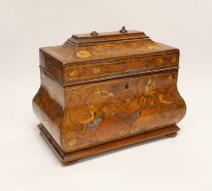 An 18th century Dutch floral marquetry bombé shaped tea caddy, 26cm wide