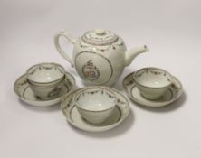 A Chinese export famille rose teapot, four tea bowls and three saucers, all Jiaqing period