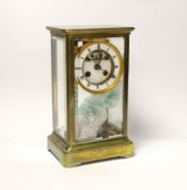 A late 19th century French brass four-glass mantel clock, striking on a bell, engraved to base, with