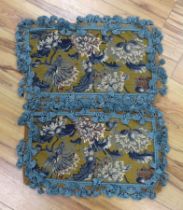Two 19th century style needle point cushion covers with turquoise tassel edging