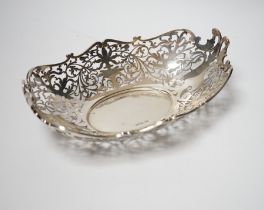 A George V pierced silver oval dish, Walker & Hall, Sheffield, 1928, 25.4cm, 13.4oz,