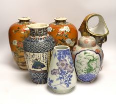 A pair of Japanese Satsuma vases, by Taizan and four others including a lidded jar and a basket vase