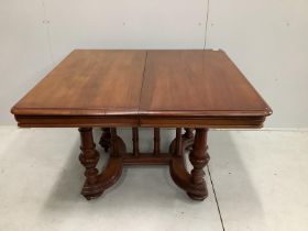 A 19th century and later French mahogany extending dining table, 232cm extended, two spare leaves,