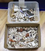 A collection of 19th century decorative clay pipes and parts