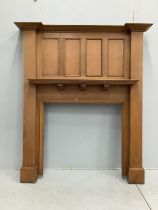 An early 20th century oak fire surround, width 68cm, height 196cm