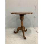 A Victorian style circular walnut tripod wine table, diameter 60cm, height 69cm