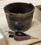 A coopered brass bound oak bucket, 24.5cm and a small pair of lacquered bellows
