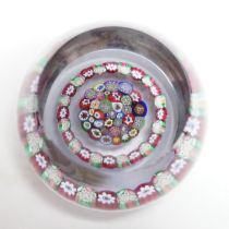 A Paul Ysart concentric millefiori garland glass paperweight, Harland period, ‘PY’ cane, 7.5cm