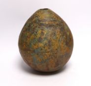 A Pre-Columbian style ovoid earthenware vase, 26cm high