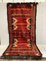 A Turkish polychrome carpet, 360 x 160cm