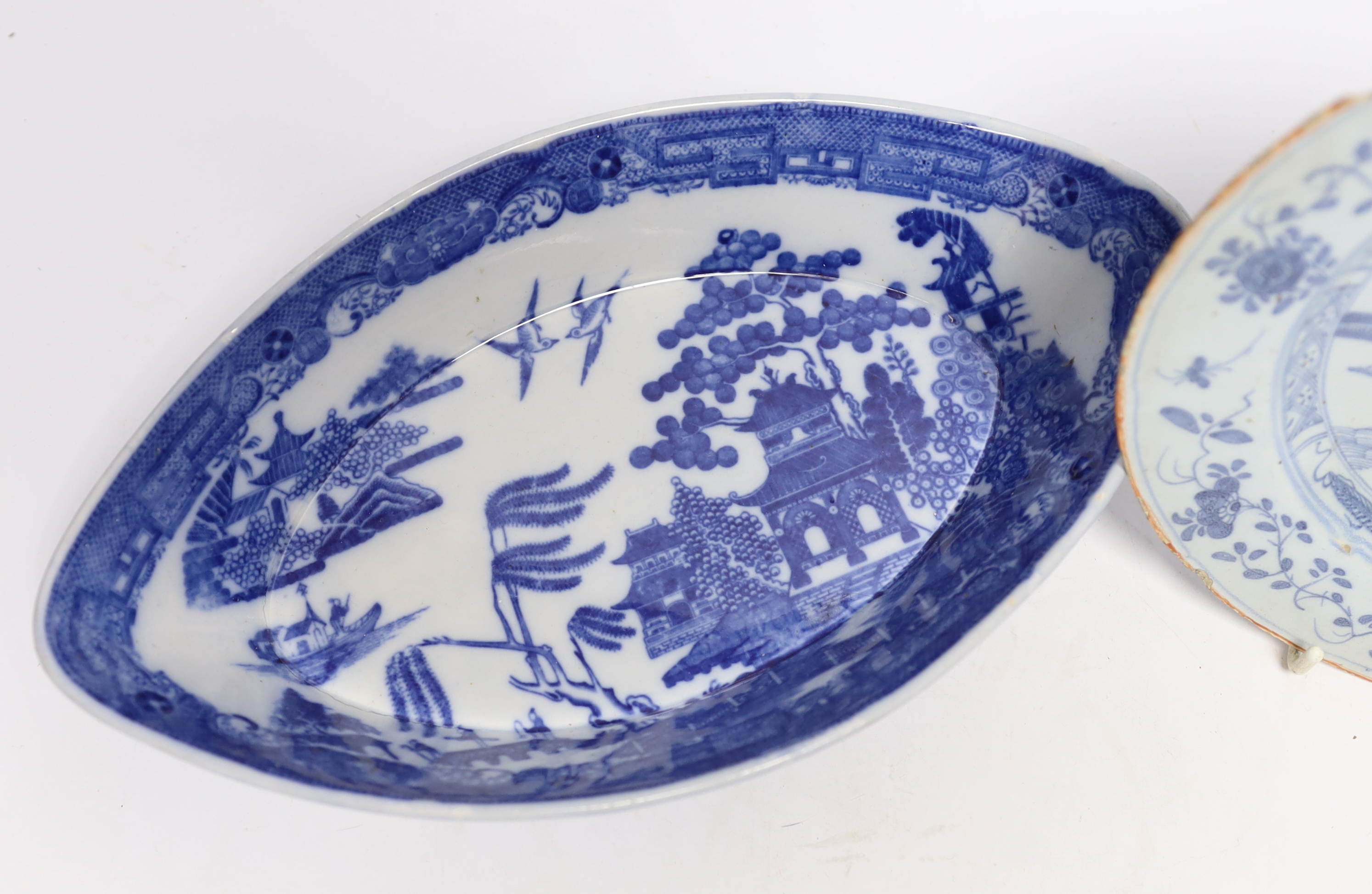 An 18th century delftware plate and blue and white pearlware plate, largest 28cm wide - Image 3 of 4