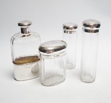 A George V silver mounted glass hip flask, London, 1912, 15.2cm, together with three matching silver