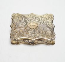 An early Victorian engraved silver gilt vinaigrette, by Nathaniel Mills, Birmingham, 1842, 46mm,