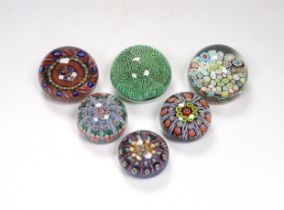 Six various millefiori glass paperweights