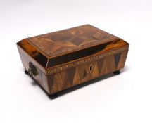 An early 19th century specimen wood, perspective cube marquetry box, 20.5cm wide, 9cm high, 15cm