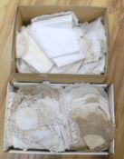 A large collection of ornate hand crochet edged table cloths, mats etc