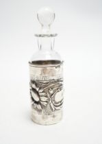 An Edwardian Art Nouveau silver mounted glass scent scent bottle and stopper, William Henry Sparrow,