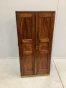 A 19th century brass mounted mahogany pigeonhole cabinet with tapered right side, possibly from a