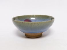 A Chinese Jun type pottery bowl, 15cm diameter