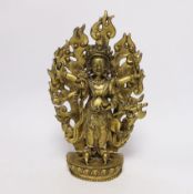 A Sino-Tibetan gilt bronze figure of Mahakala with flame form mandala, 29cm high