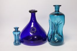 Three Holmegaard blue glass decanters, tallest 26cm high
