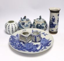 A Japanese blue and white wall plate, a pair of Chinese jars and covers, cylindrical crackle glaze