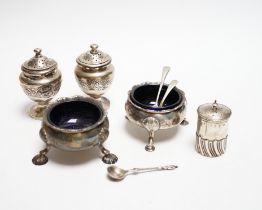 Two Georgian silver bun salts and three other silver condiments.